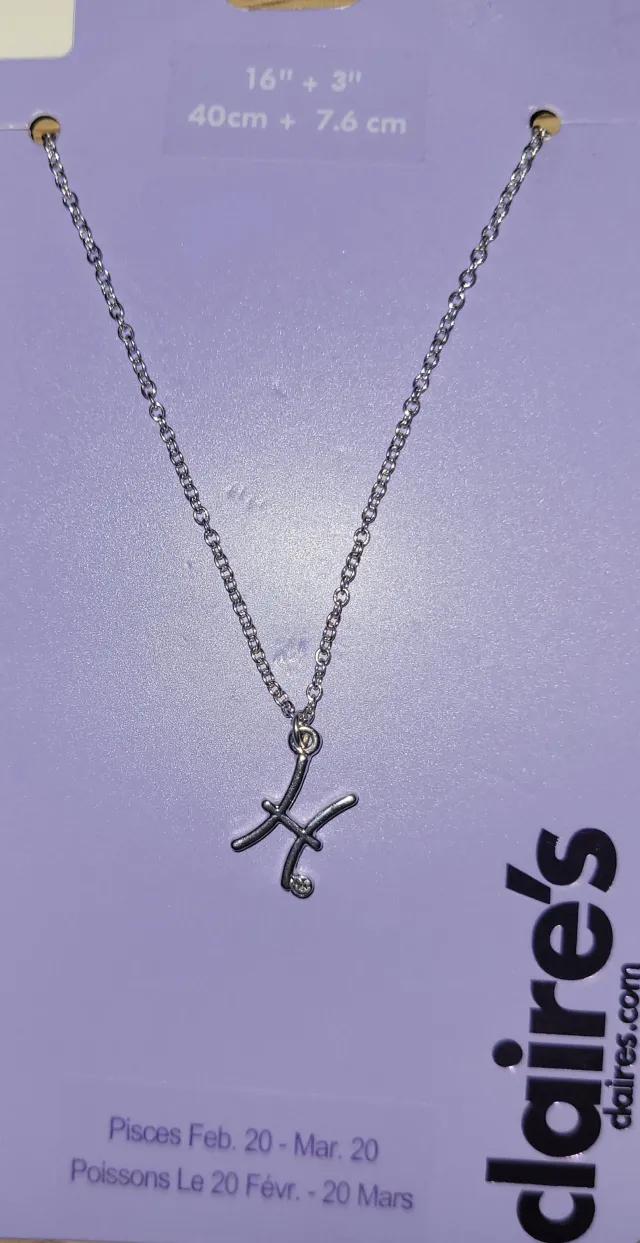 Stjernetegnsmykke Fiskene Pisces sølvfarget Claire's