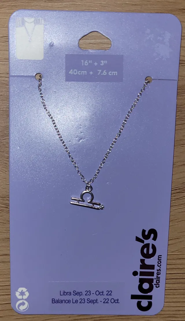 Stjernetegnsmykke Vekten Libra sølvfarget Claire's