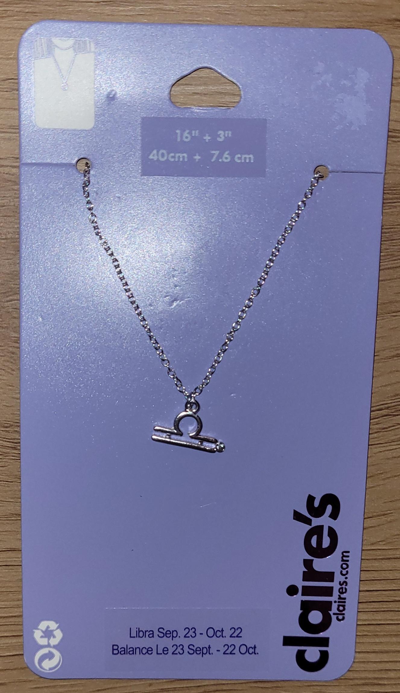 Stjernetegnsmykke Fiskene Pisces sølvfarget Claire's