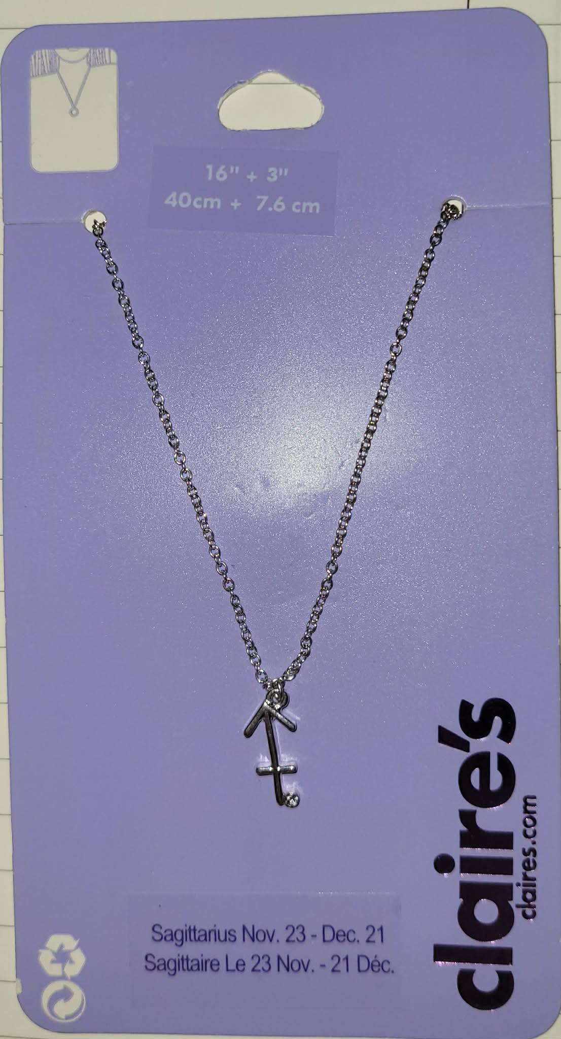 Stjernetegnsmykke Skytten Sagittarius sølvfarget Claire's
