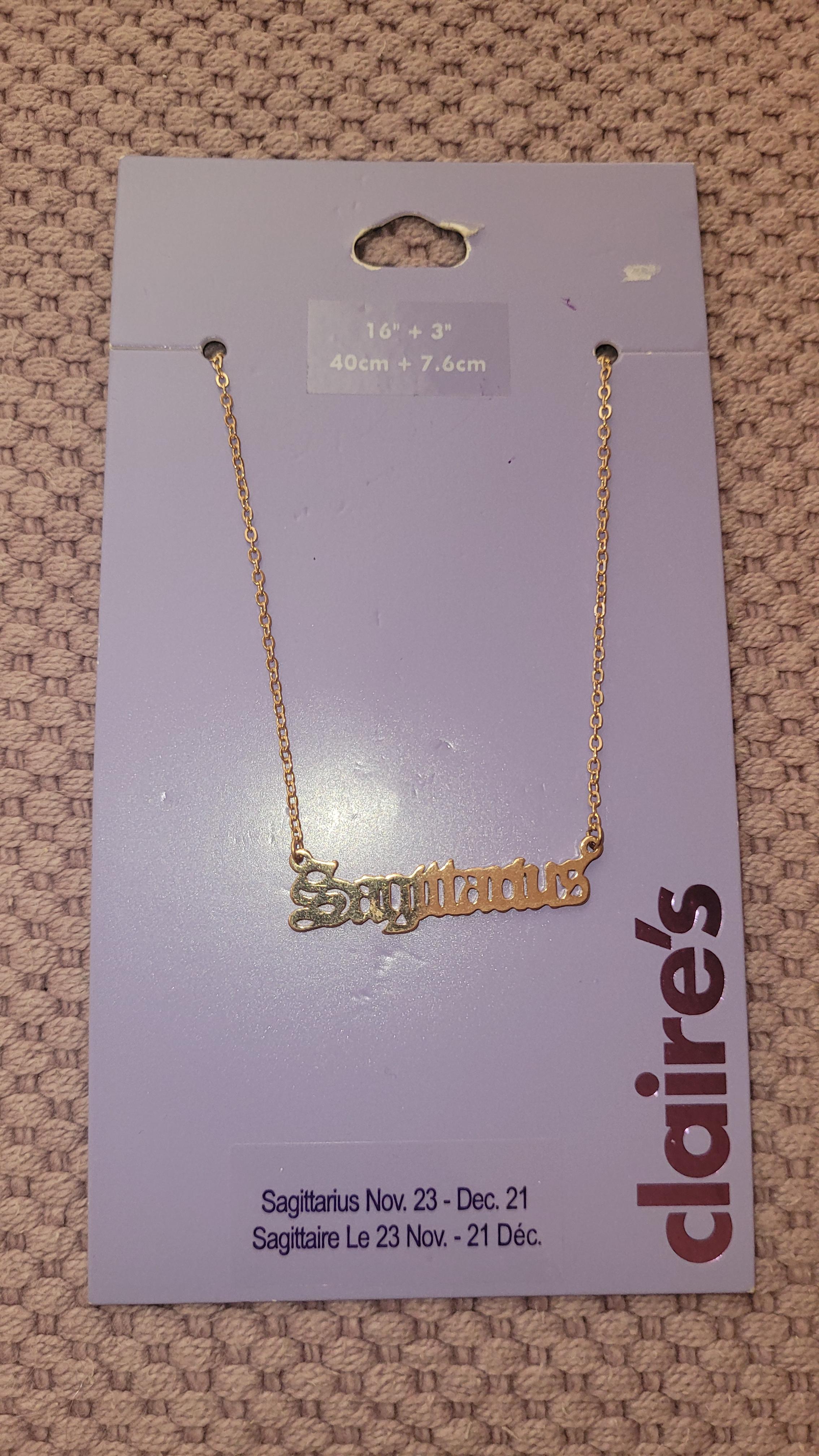 Stjernetegnsmykke Skytten Sagittarius gullfarget Claire's