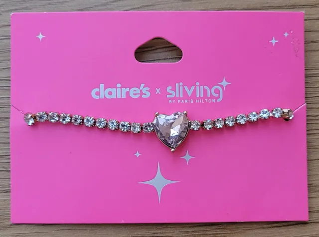 Paris Hilton armbånd med blanke stener og rosa hjerte