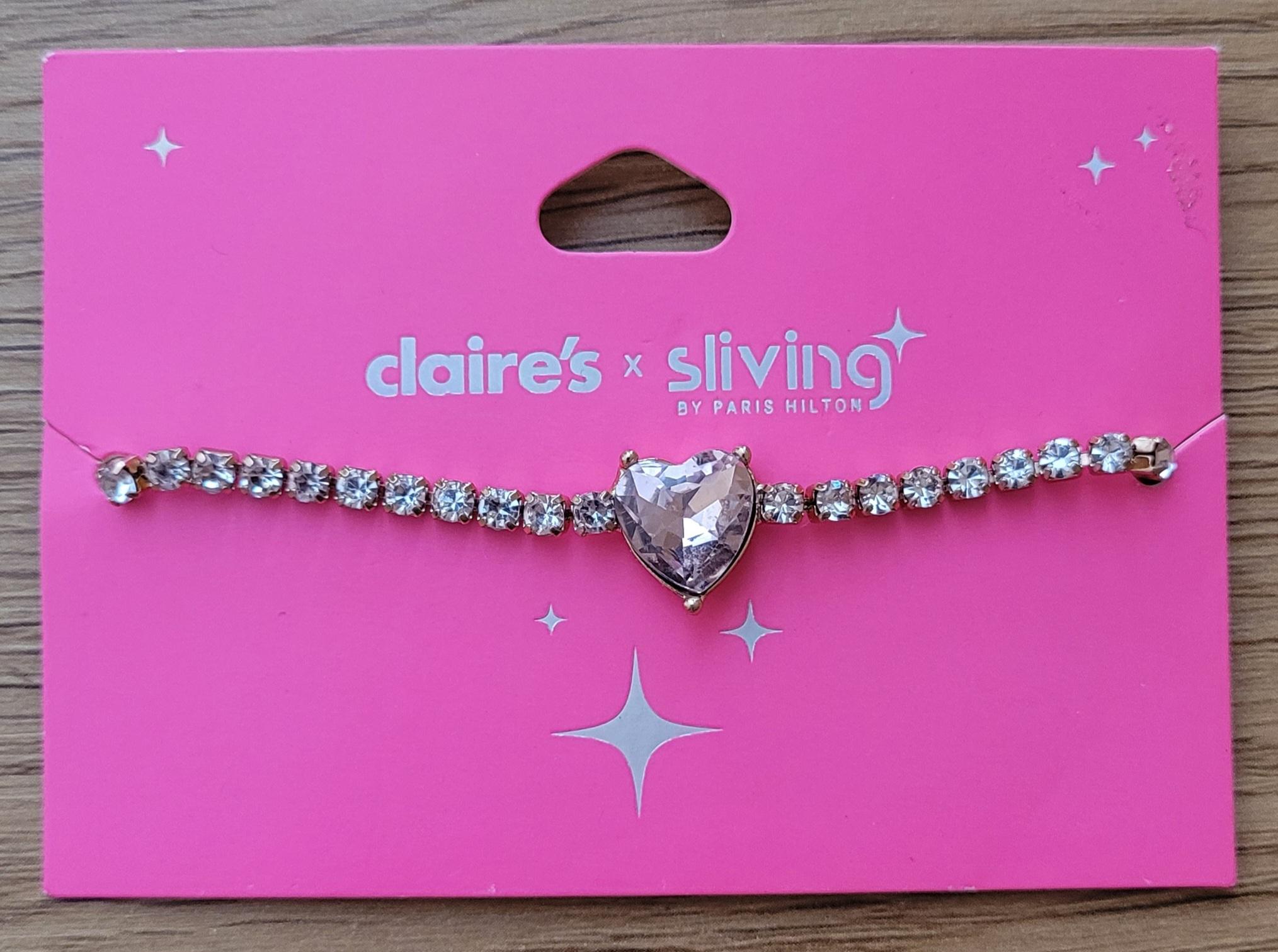 Paris Hilton armbånd med blanke stener og rosa hjerte